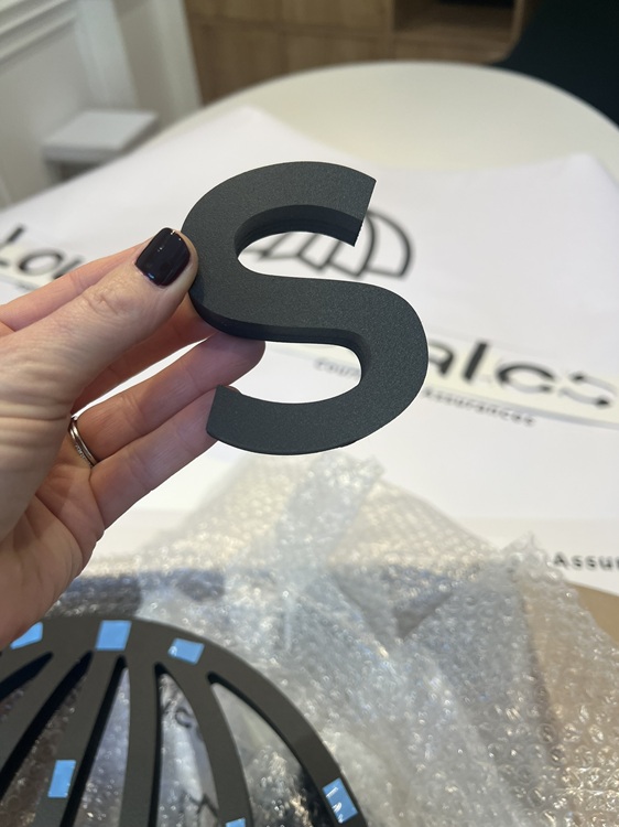 La signalétique du bureau dédié à l’épargne et au patrimoine